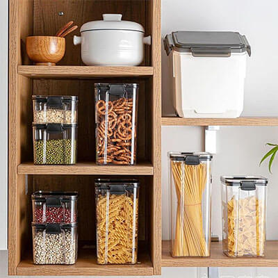 Plastic containers in cabinet