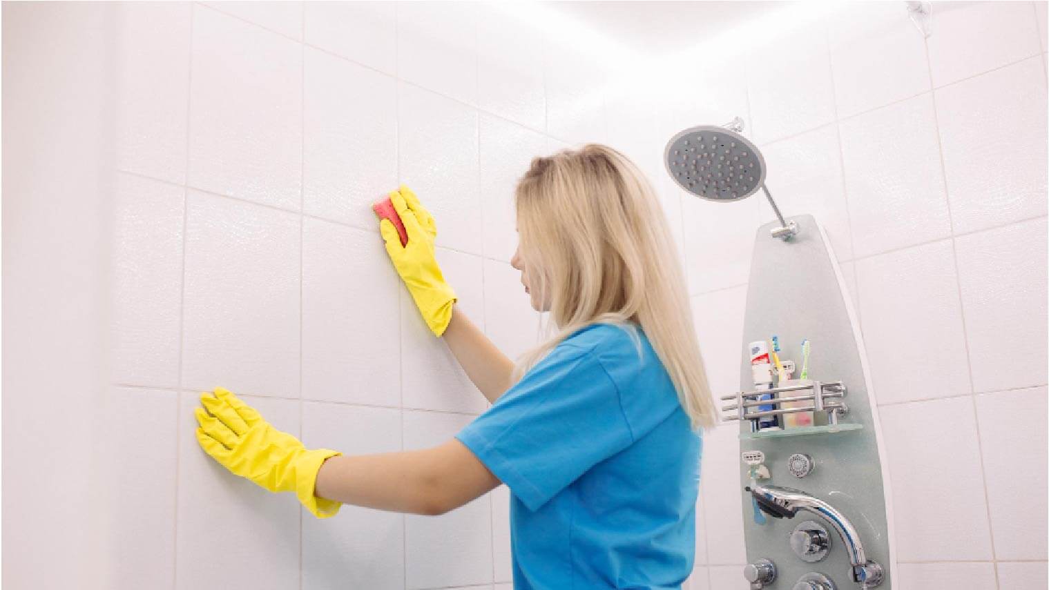 women cleaning bathroom tiles