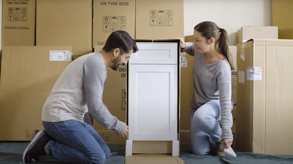 Homeowners Unboxing Pre-assembled KraftMaid Cabinets