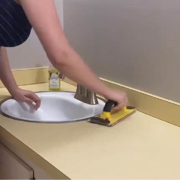 women sanding Bathroom Countertops